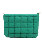 trousse toilette de femme tissu matelassé