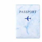 protège passeport marbre avion