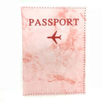 couverture passeport marbre avion