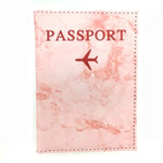 couverture passeport marbre avion